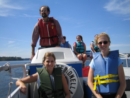 Photograph of Richard Fox and students on boat